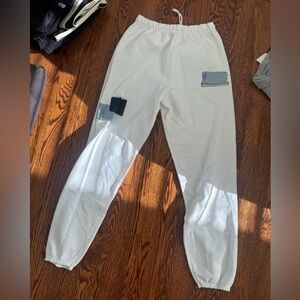 Women’s size Medium white sweatpants with denim patching